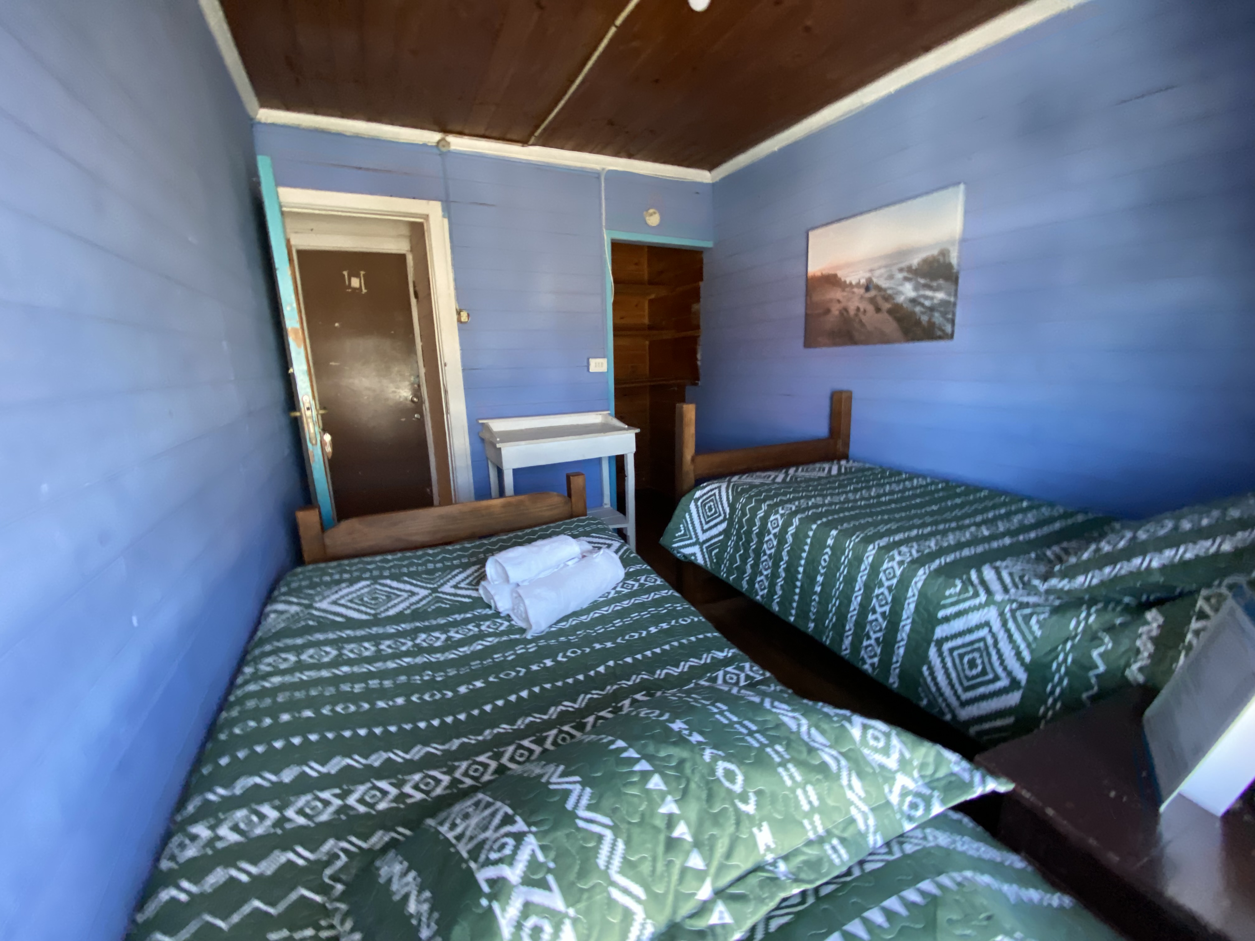 Doble con 2 camas y baño compartido..