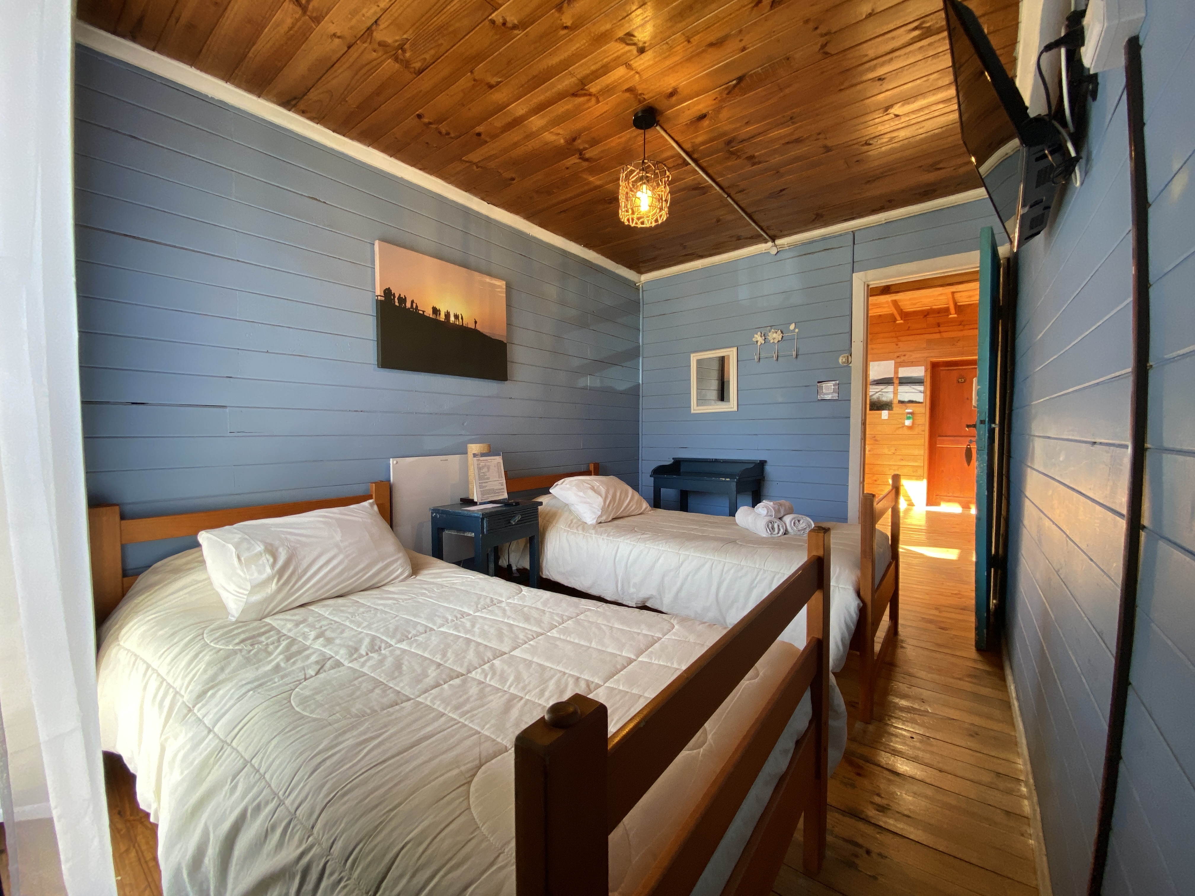 Doble con 2 camas y baño compartido..